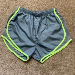 Gray and highlighter yellow Nike Tempo shorts